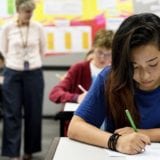 Students taking a test in school