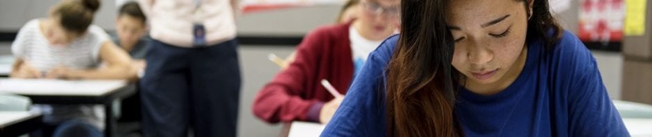 Students taking a test in school