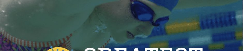 Closeup of girl with goggles race swimming in chlorine pool